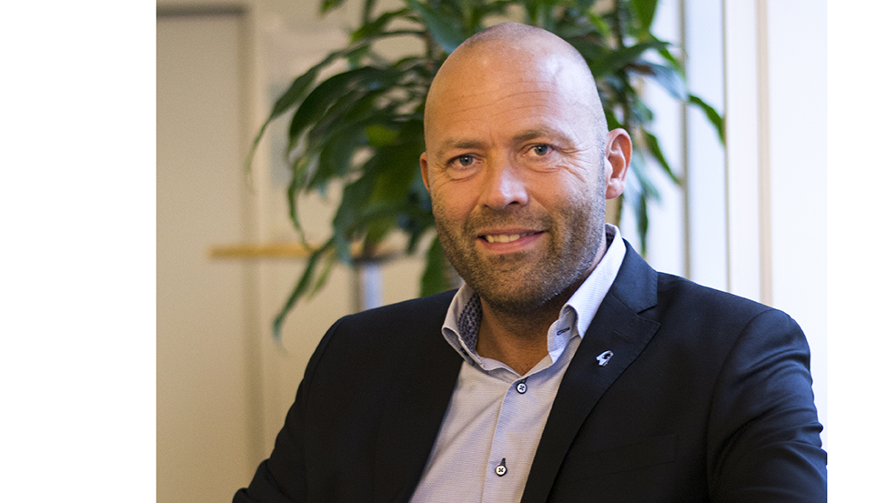 Porträtt av en man i kostym