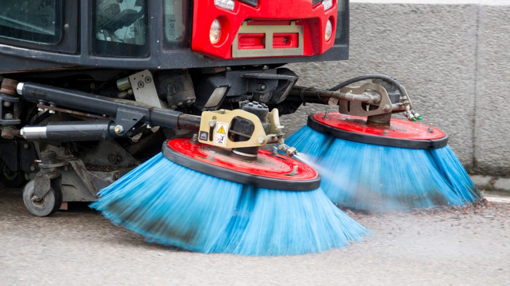 Sandupptagning och vårsopningsmaskin