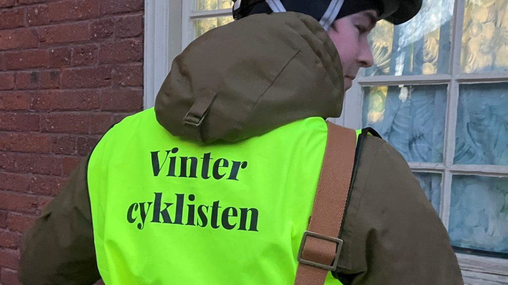 En reflexväst med ordet Vintercyklisten